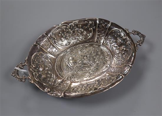 A continental 930 sterling two handled embossed oval dish, 20.2cm.
